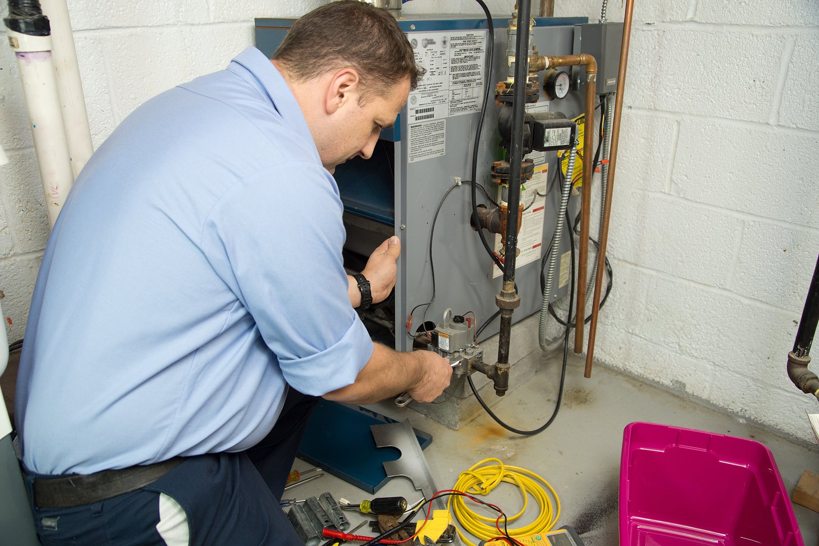 Man installation a new furnace